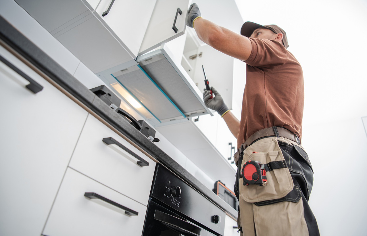 contractor installing cabinets contractor installing cabinets